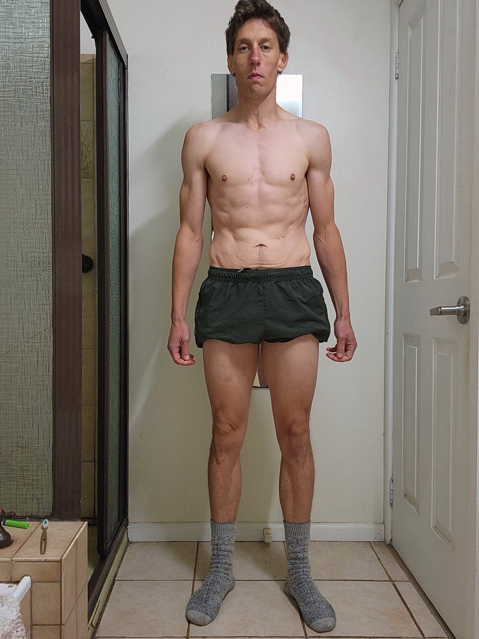 Darcy after coaching, lean with visible abs